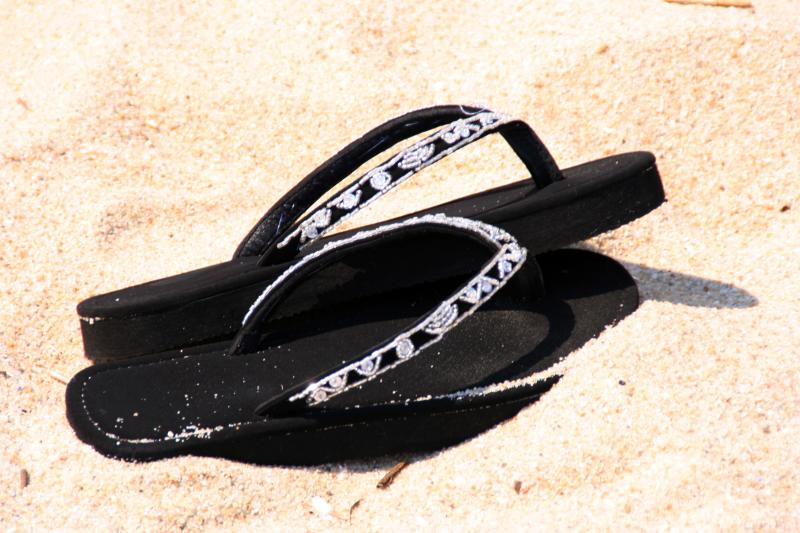 slippers by the sea
