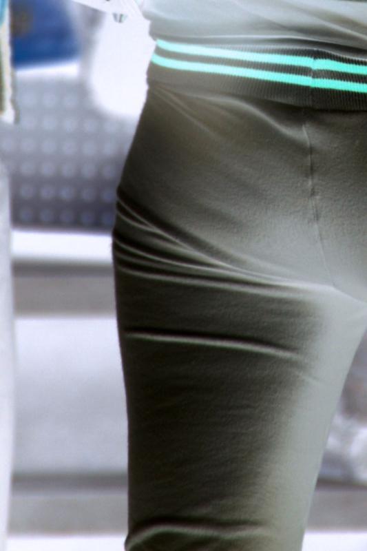 behind