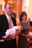 godparents follow priest