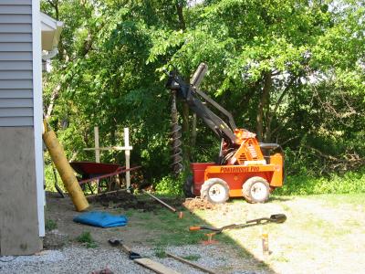 Phase Two - Rented mini Skid Steer - to dig 19 four ft deep postholes