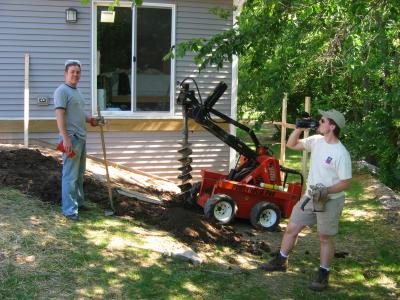 Taking a break - Is that posthole straight?