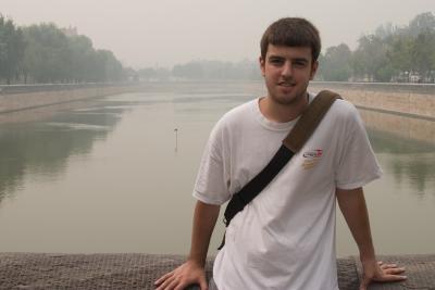 Your humble photographer in front of the Forbidden City's moat.