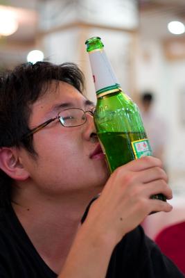 Masa showing his love for the Tsingtao.  He was quite drunk.