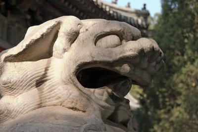 Lion protecting the entrance to Jietai Temple.