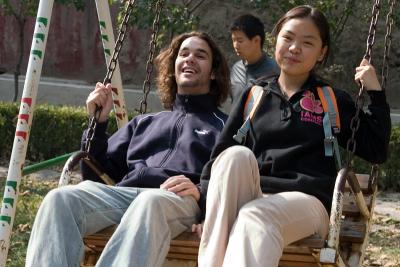 Chris and Li laoshi on the swing.