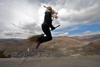 Jae showing her Halloween spirit by flying around the mountain on her broom.