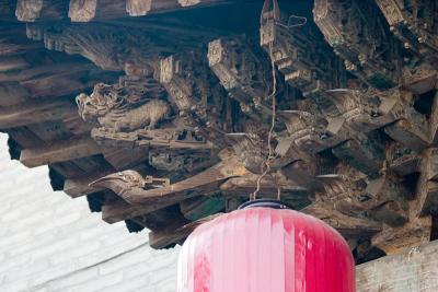 Intricate woodwork under the eaves.