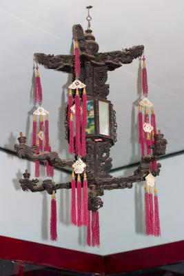 An elaborate nine dragon lamp, one of only a handful of its kind in China.