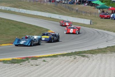 I BELIEVE THAT THE SECOND CAR IS THE OLD PENSKE SUNOCO CAN AM CAR THAT MARK DONAHUE DROVE