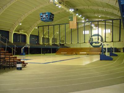 A VIEW OF THE INSIDE OF THE SKIP PALRANG FIELD HOUSE AT BOYS TOWN AS FAMILY MEMBERS WATCH