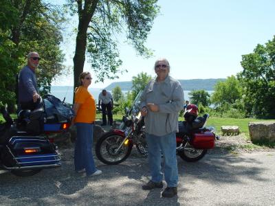 SANDY AND KAREN GEE ALONG WITH CRAIG ROMIG ENJOY THE VIEW FROM THE BLUFFS OVERLOOKING THE ST. CROIX RIVER