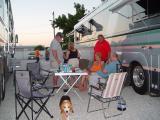 THE GROUP STARTS TO PREPARE FOR THE STEAK FEAST AS BUDDY SUPERVISES