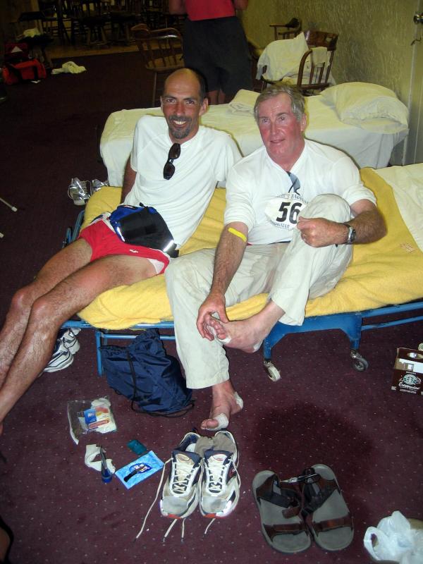 Miles Hilton-Barber stops for blister help in the SPW medical HQ.