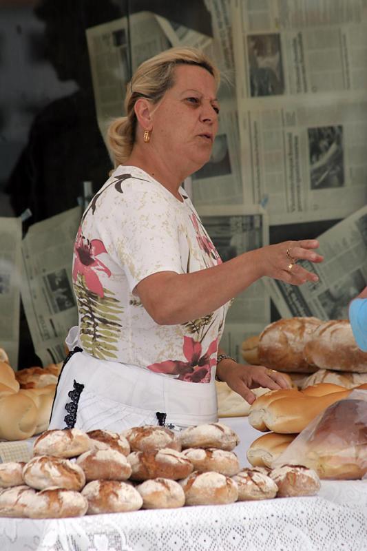 Selling bread by the river