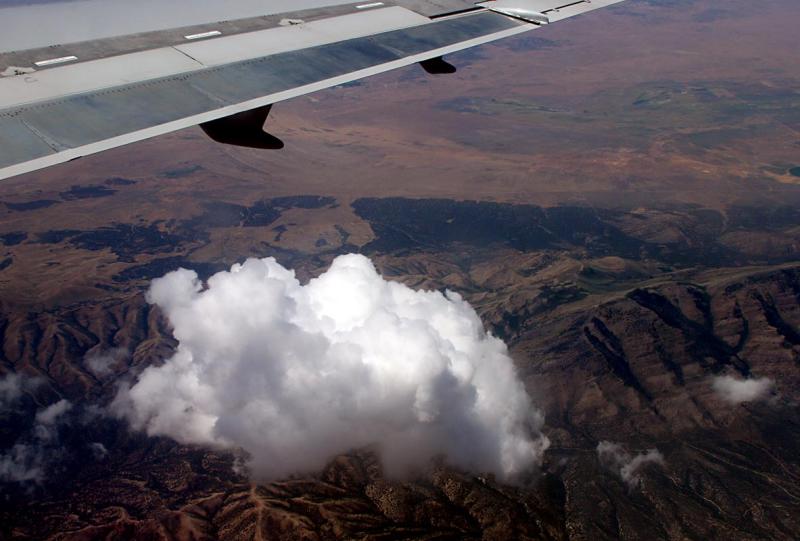 Wing, cloud, mountain