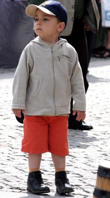 Waiting for mom in the open air market