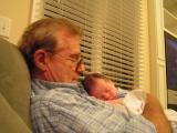 Papa and new grandson Carter share a snooze