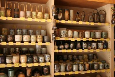 A front shot of the pottery store, you can see price for each piece, some per piece, some per set