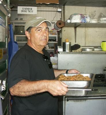 Frank Russo volunteering in kitchen.jpg