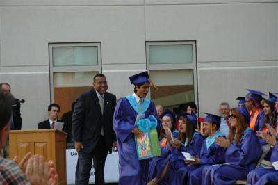 Kunaal receiving the Spencer Family award for community service