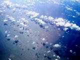 Sky High....looking down at the Pacific Ocean below, 7 more mins until our initial descent in to HNL