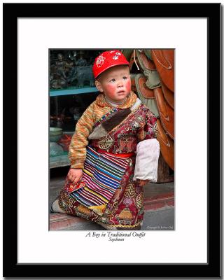 A boy in traditional outfit