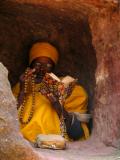 Hermit in hole in churchyard