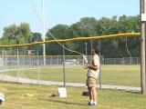 Don works the ropes to bucket the birds down.