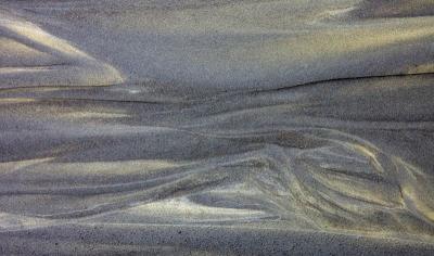 Visions in Sand on a Beach