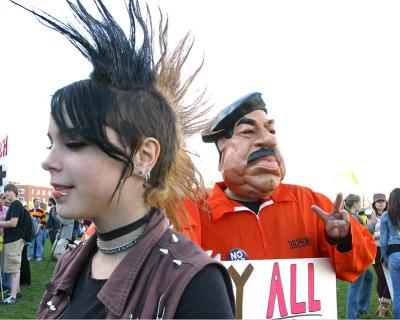 Saddam and passing student.jpg