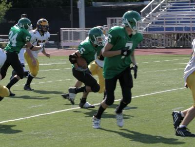 Jeremy Sedelmeyer carrying the ball early in the 4th quarter