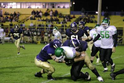 Jimmy Kvassay fighting for yards