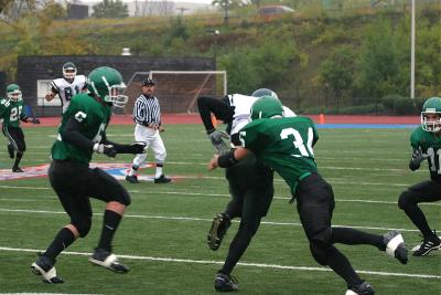 Jimmy Kvassay tackling the Spartan receiver
