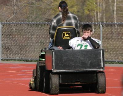 Evan Ekstrom carted off the field with an injury