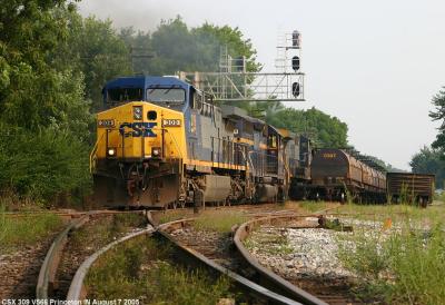 A SB coal train pounds the NS diamond at Princeton