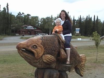 Lilli rides the wooden fish with mommy.JPG
