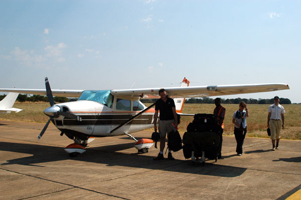 V5-FIS on the ground at Livingstone International Airport (FLLI)