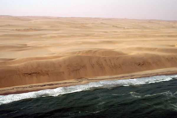 South of Sandwich Harbour, dunes rise steeply from the Atlantic