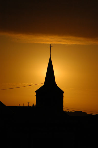Sunset with a chuch tower, Lüderitz