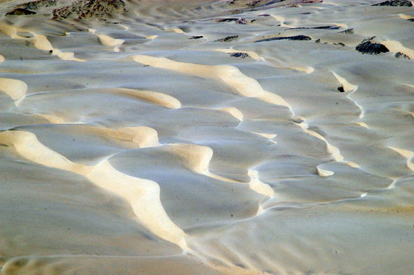 Sandy desert nearing the coast