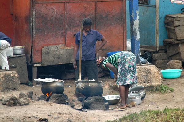 Cooking outdoors on the south side of Nkrumah Circle