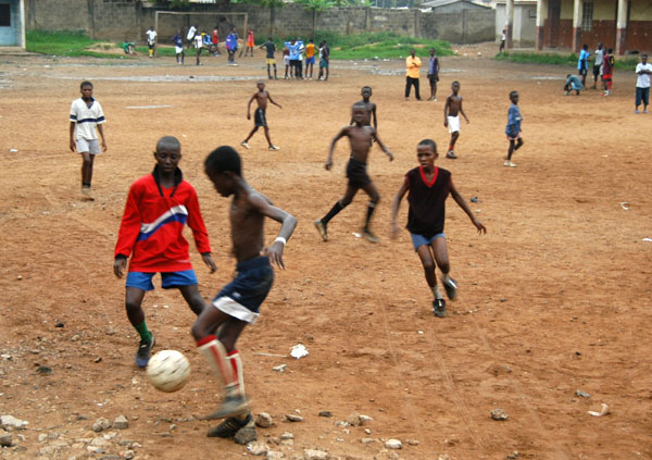 Football on the playground of Liberty Avenue School