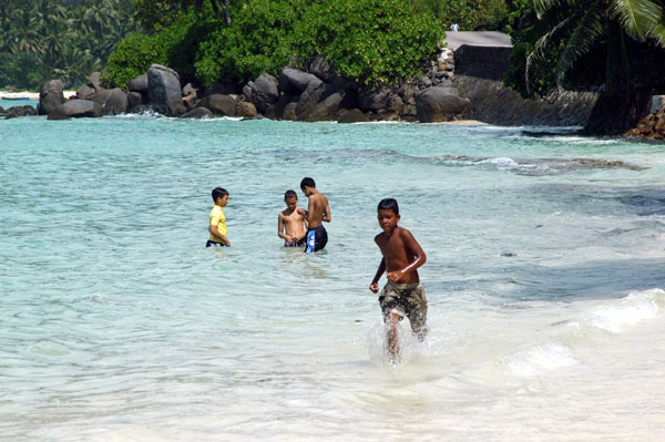 Local boys at Anse Royale, Mahé Island