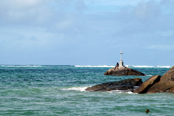 Cross erected on a rock offshore