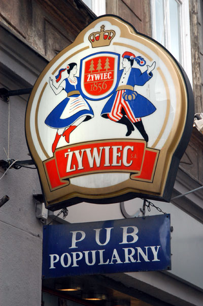 The musician's outfits look a bit like the Zywiec Beer logo man