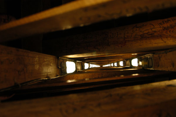 Looking down the wooden stairwell into the depths of the mine