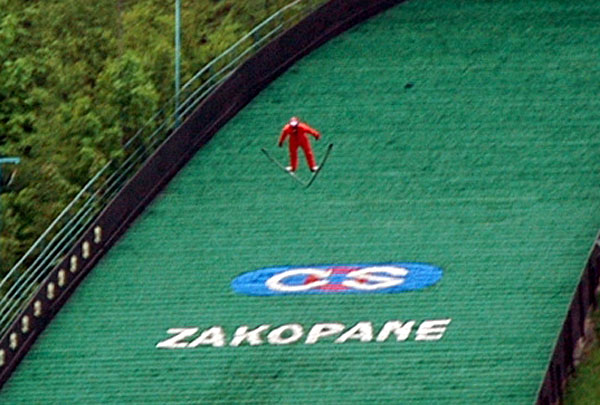 Ski jumper airborne training in summer at Zakopane