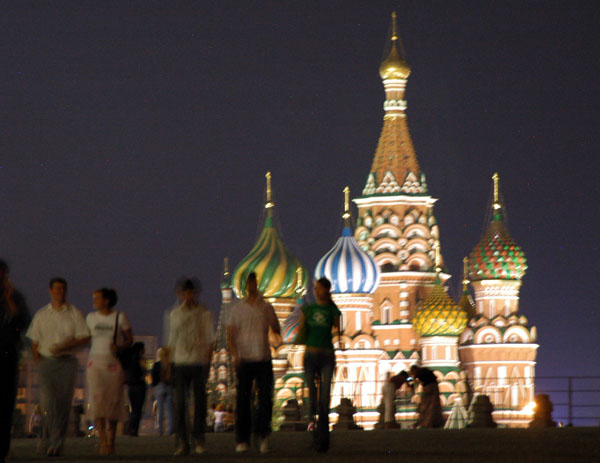 Pedestrians enjoying a summer night on Red Square