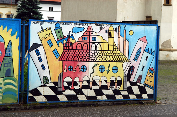 Murals on construction barriers, Levoča