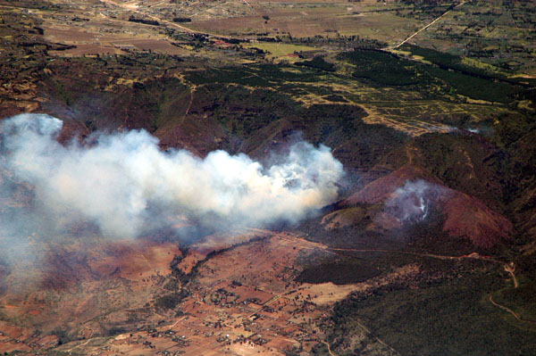 Forest fire along the rim of the Great Rift Valley just south of Lake Naivasha, Kenya